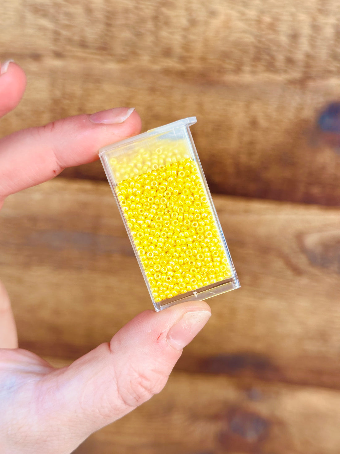 11/0 Opaque Yellow AB