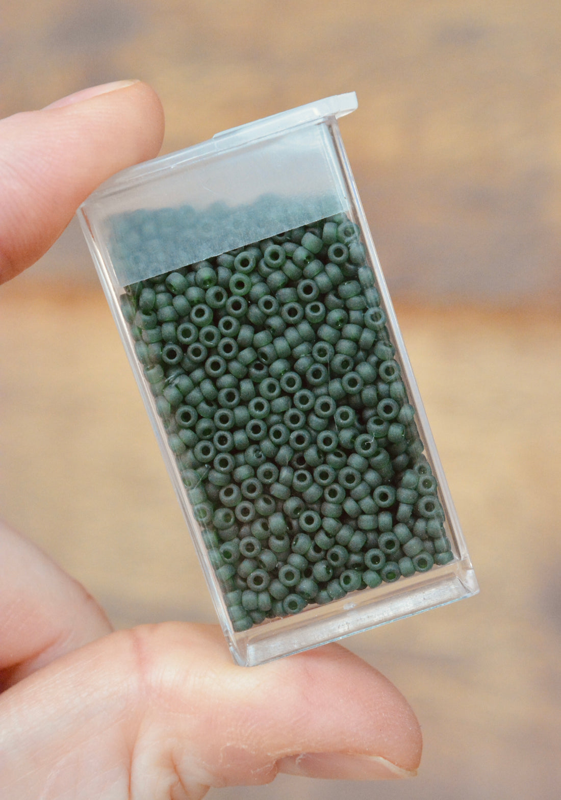 11/0 Matte Transparent Dark Emerald
