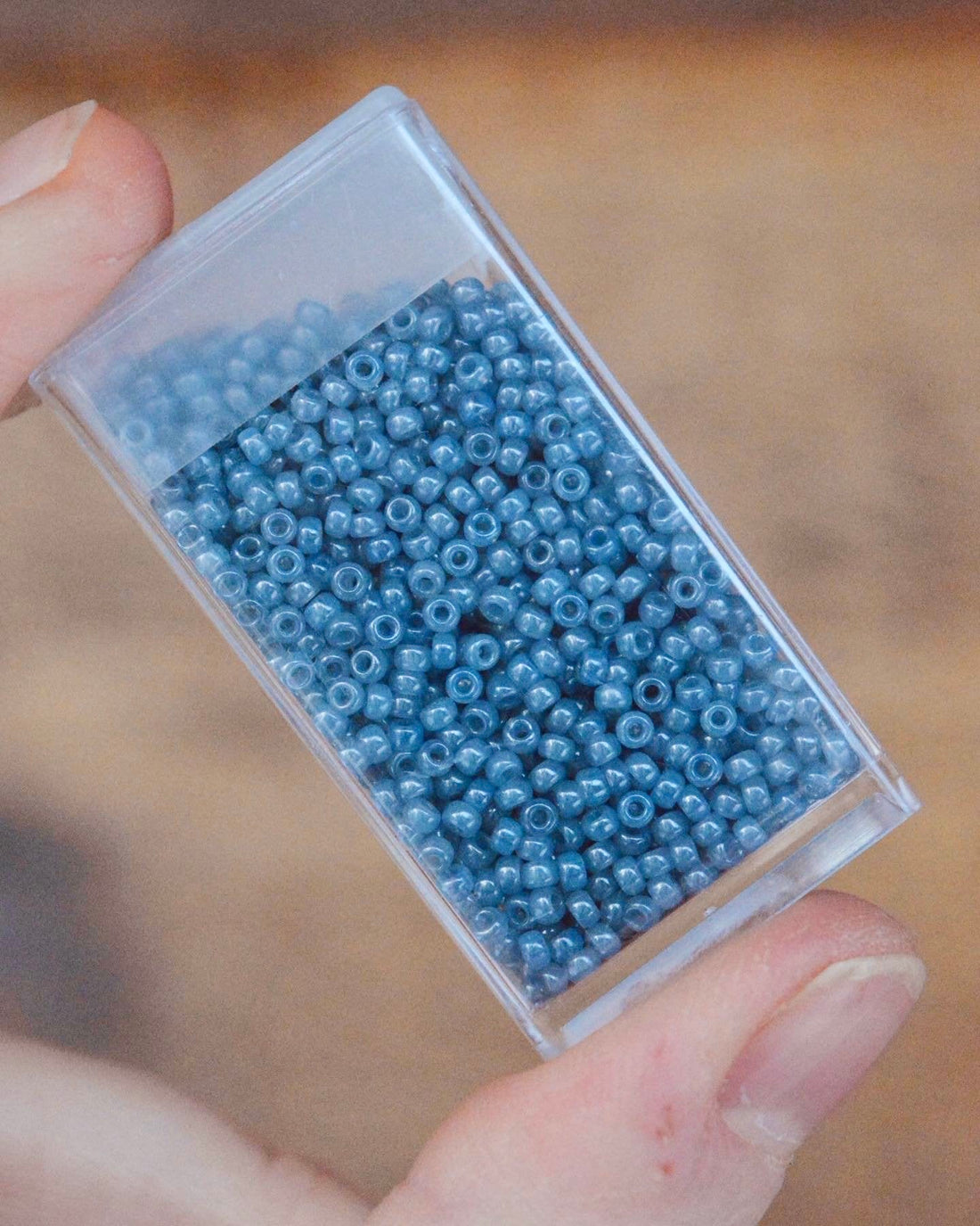 11/0 Transparent Steel Blue Luster