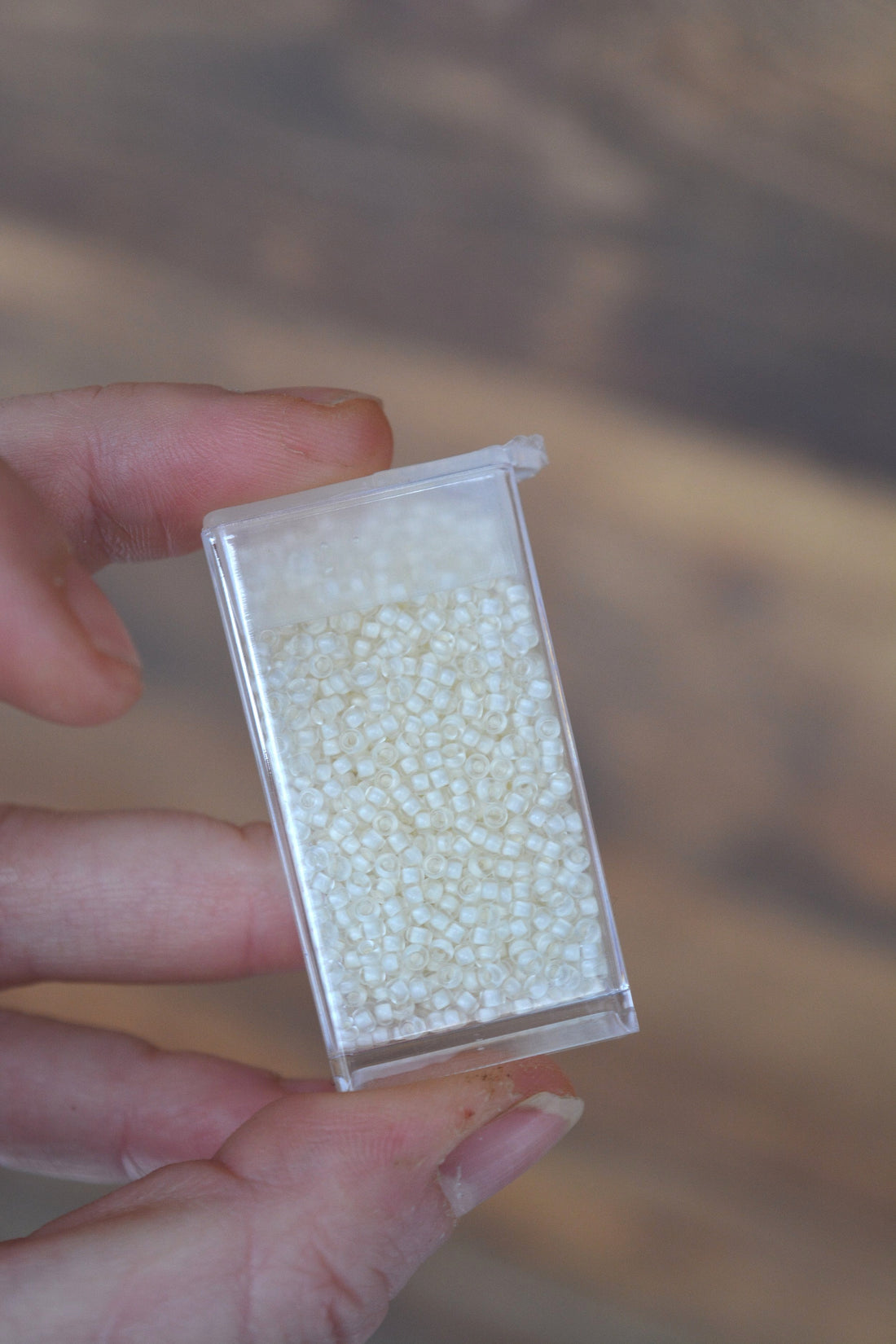11/0 Semi-Frosted White Lined Crystal