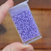 11/0 Semi-Frosted Lilac Lined Crystal