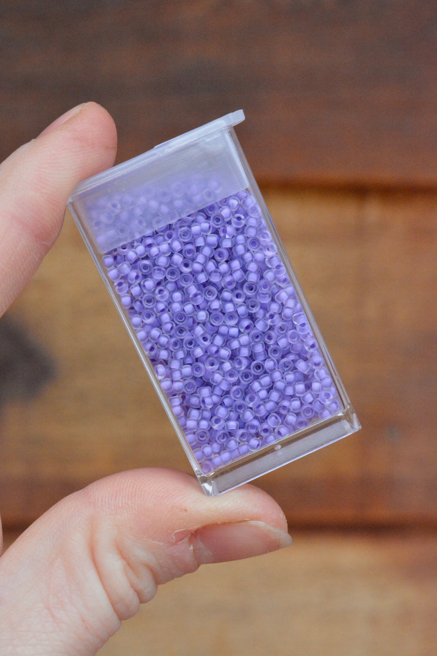 11/0 Semi-Frosted Lilac Lined Crystal