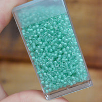 11/0 Dark Mint Green Lined Crystal